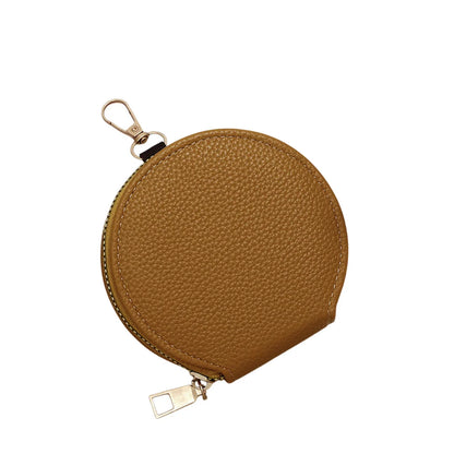 Coconut round zippered pouch with a keychain on a white background