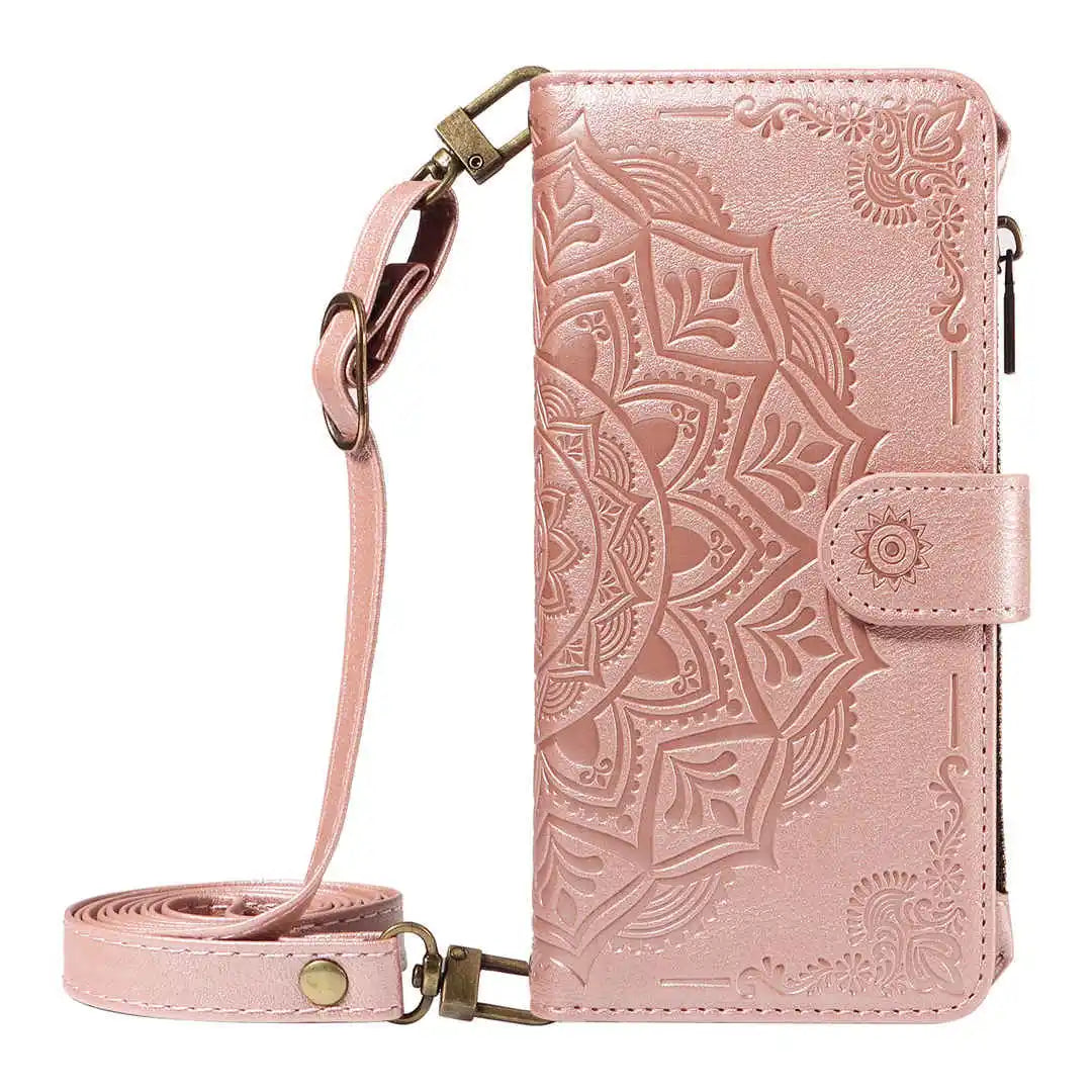 Pink wallet phone case with mandala design and detachable strap on a white background