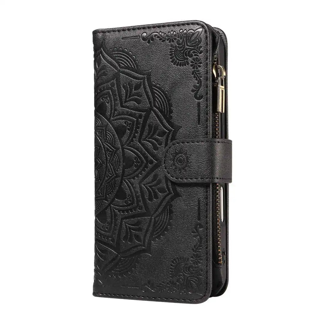 Black wallet phone case with intricate floral design on a white background