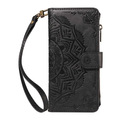 Black embossed folio wallet phone case with a strap on a white background