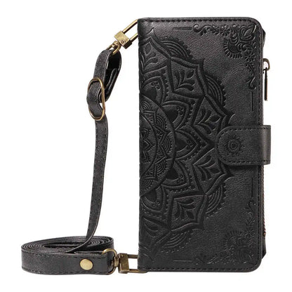 Black embossed phone case with crossbody strap on a white background
