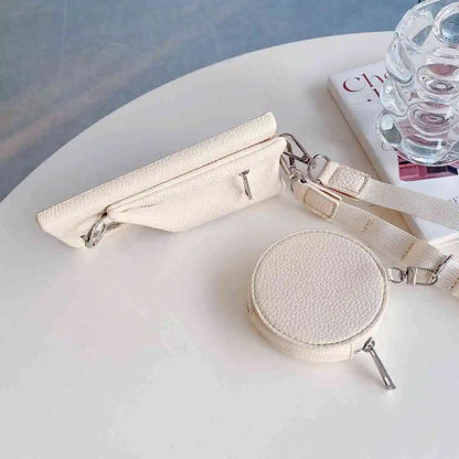 White samsung wallet case with a strap and pouch on a light surface