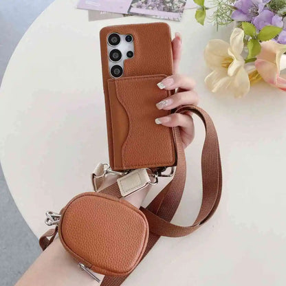 Brown wallet phone case with a detachable strap and pouch for Samsung held by a hand on a light background with flowers.