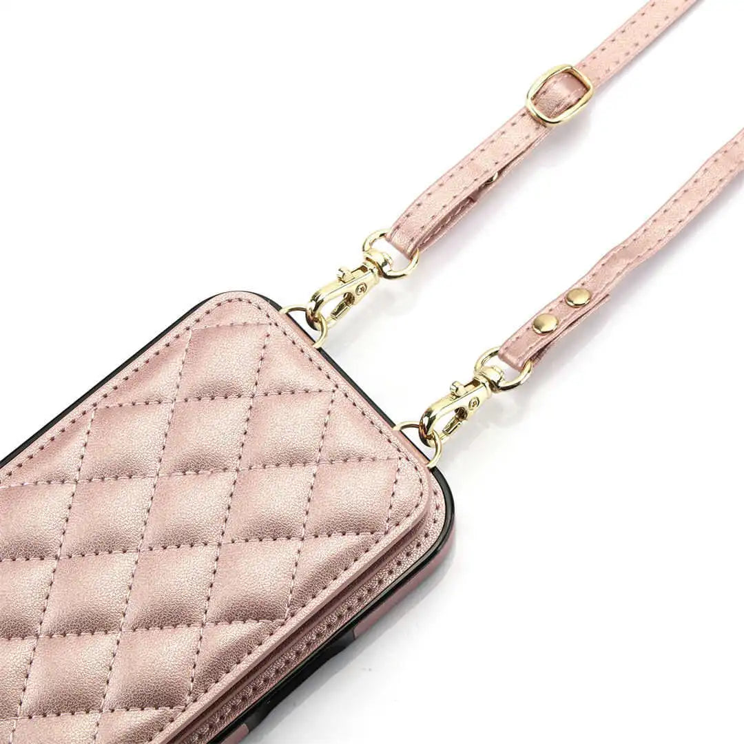 Pink quilted wallet phone case with a strap on a white background