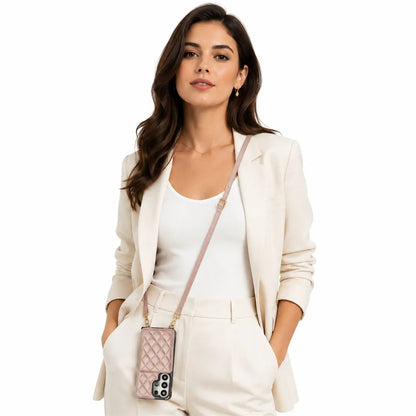 Woman in a white outfit with a pink quilted wallet phone case on a white background