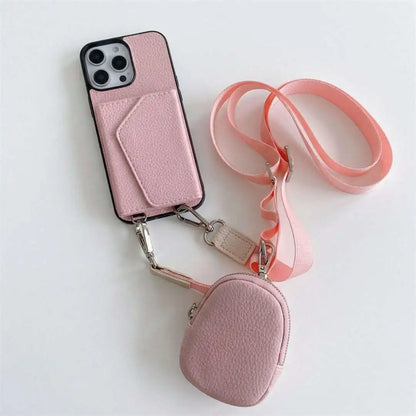 Pink crossbody wallet phone case with attached pouch and lanyard on a white background