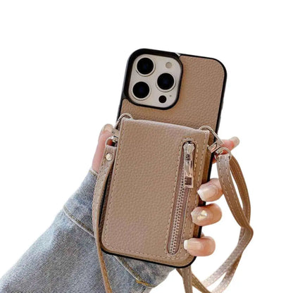 Taupe wallet Phone case with detachable strap held by a hand on a white background