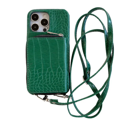 Green crocodile pattern wallet phone case with a strap on a white background