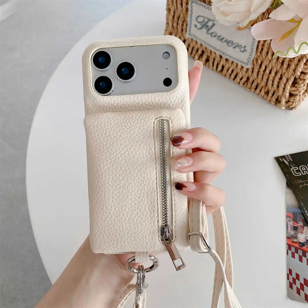 Hand holding a beige snap-on wallet crossbody phone case on a light gray background.