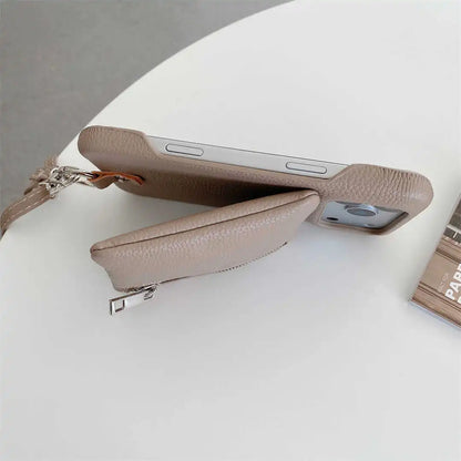 Phone case with a detachable strap on a white surface