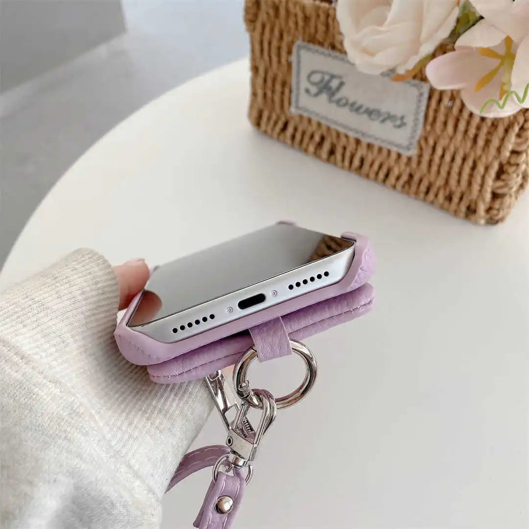Purple phone case with finger ring.