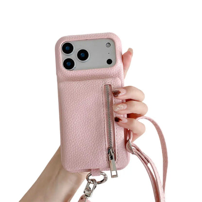 Pink phone case with a strap held by a hand on a white background