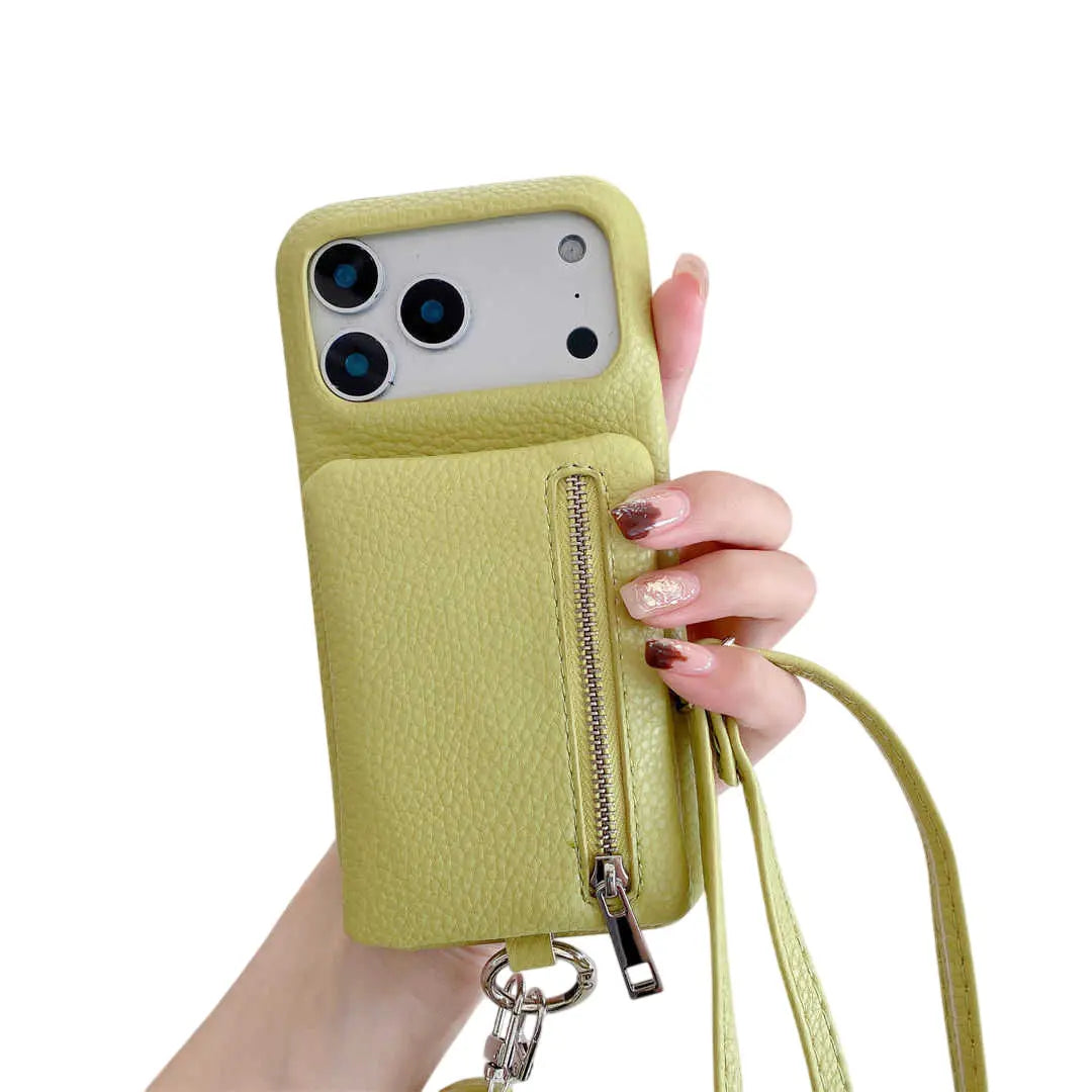 Green phone case with a zipper pocket held by a hand on a white background