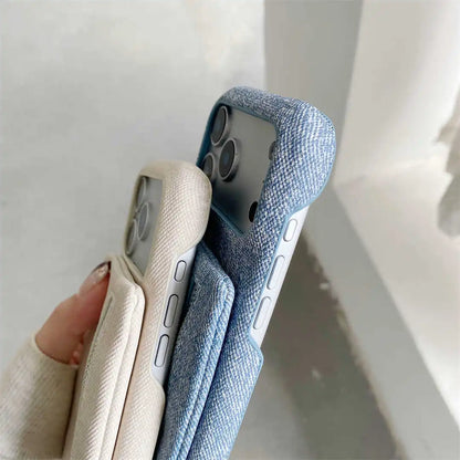 Two phone cases, one beige and one blue, held against a light background.