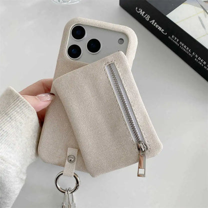 Beige phone case with zipper wallet held by a hand on a light background