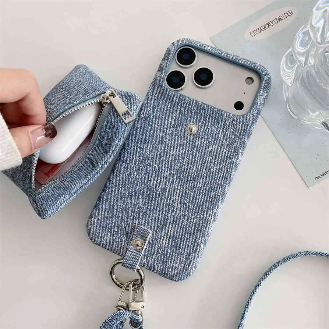 Blue denim phone case with a detachable wallet on a light surface