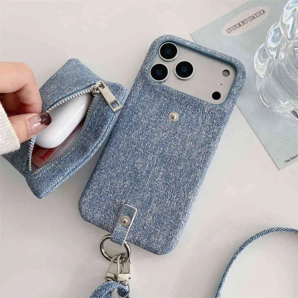 Blue denim phone case with a detachable wallet on a light surface