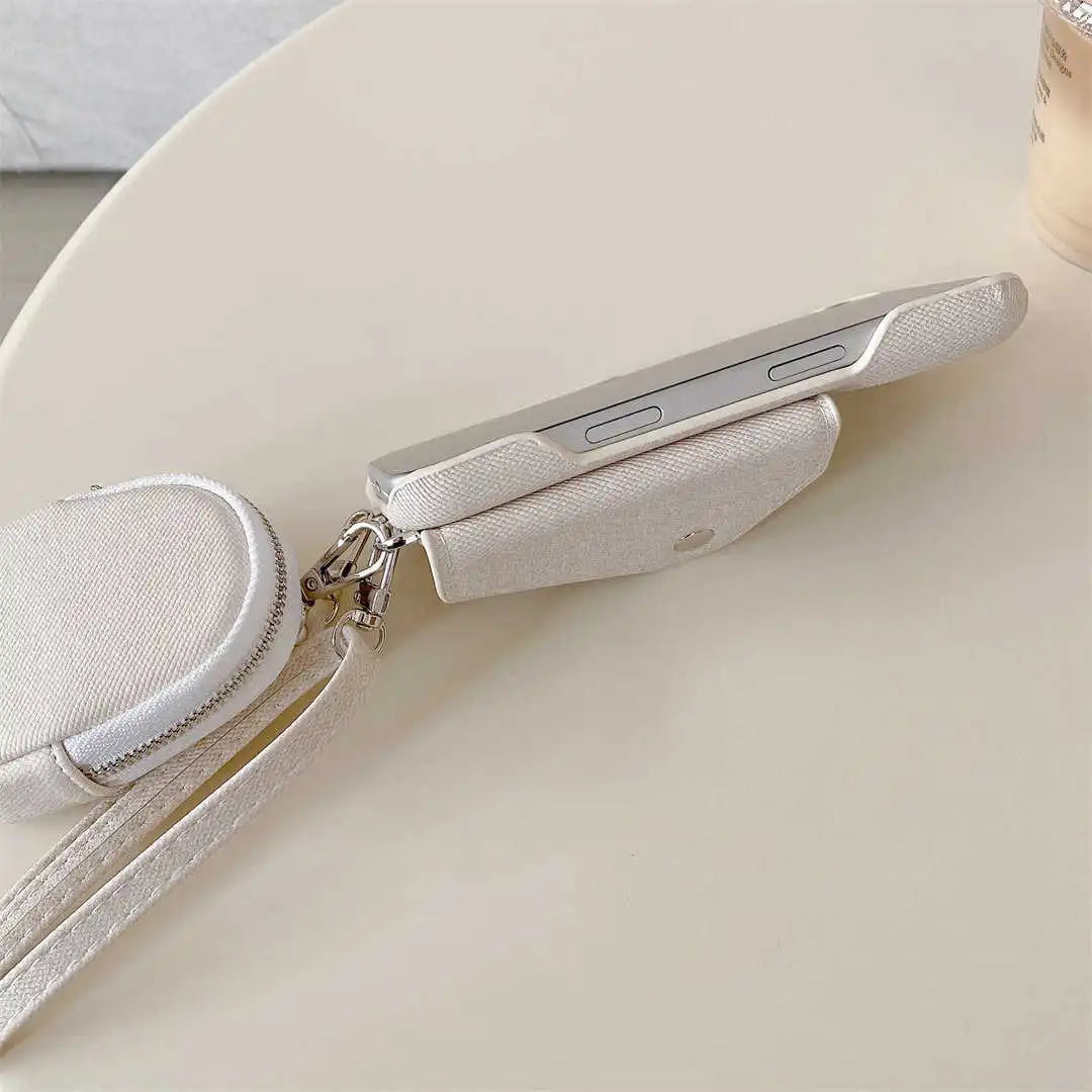 side of a denim crossbody wallet phone case with pouch