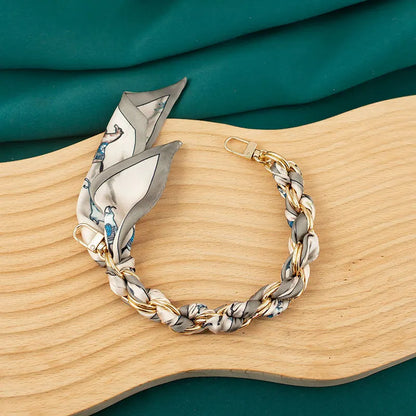 blue bird scalf chain wristlet