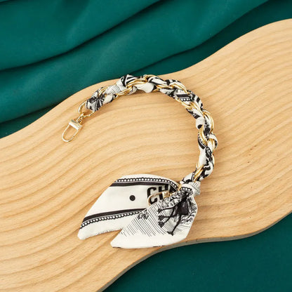 black scalf chain wristlet
