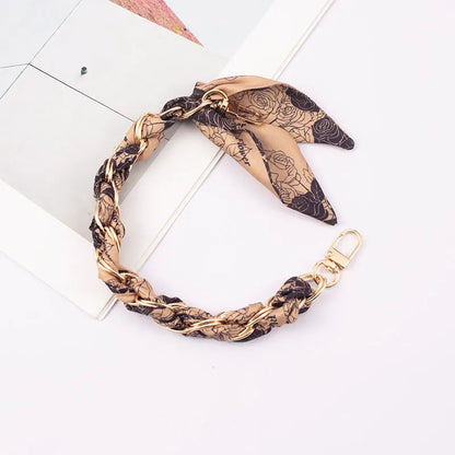 black floral scalf chain wristlet