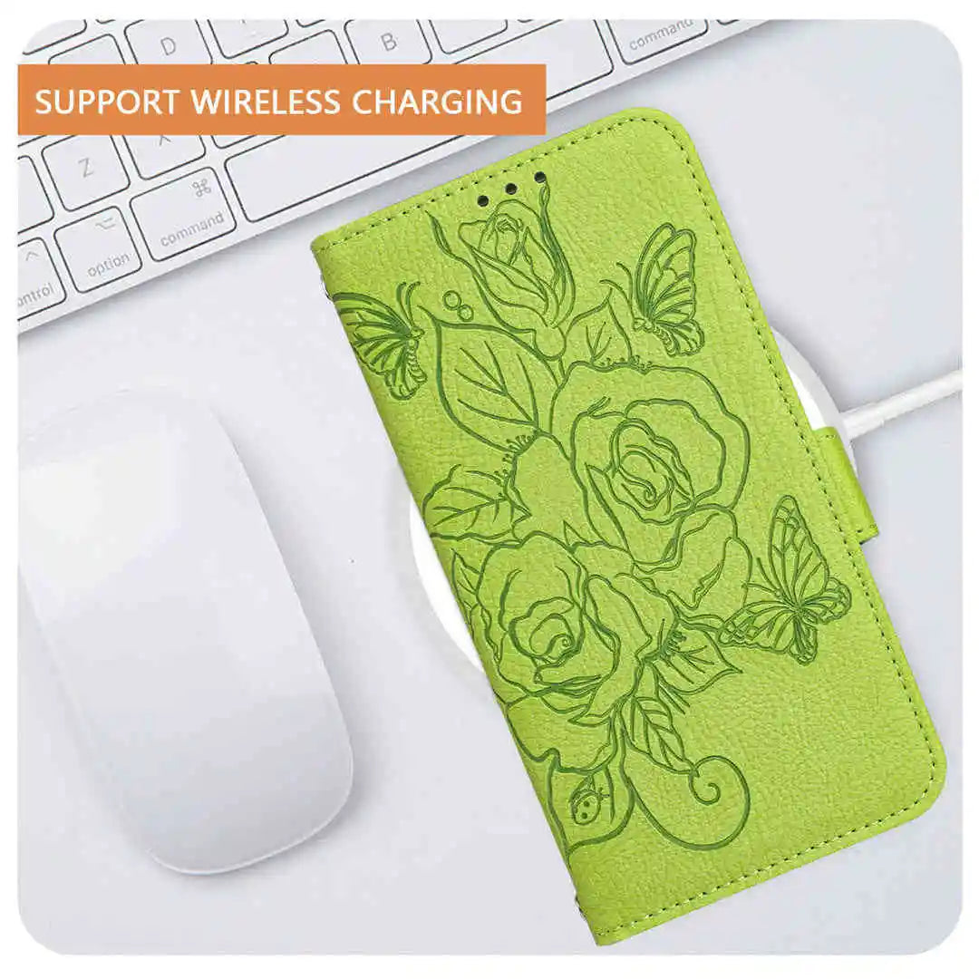 Green wallet phone case with floral design on a desk with keyboard and mouse