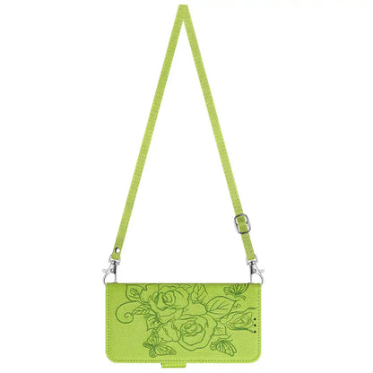 Green crossbody iPhone folio wallet case with floral embroidery on a white background
