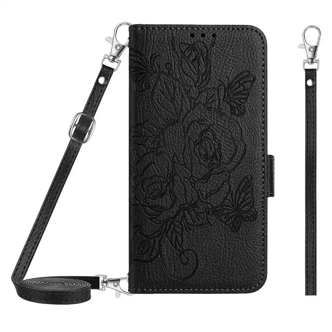 Black folio wallet phone case with floral design and detachable strap on a white background