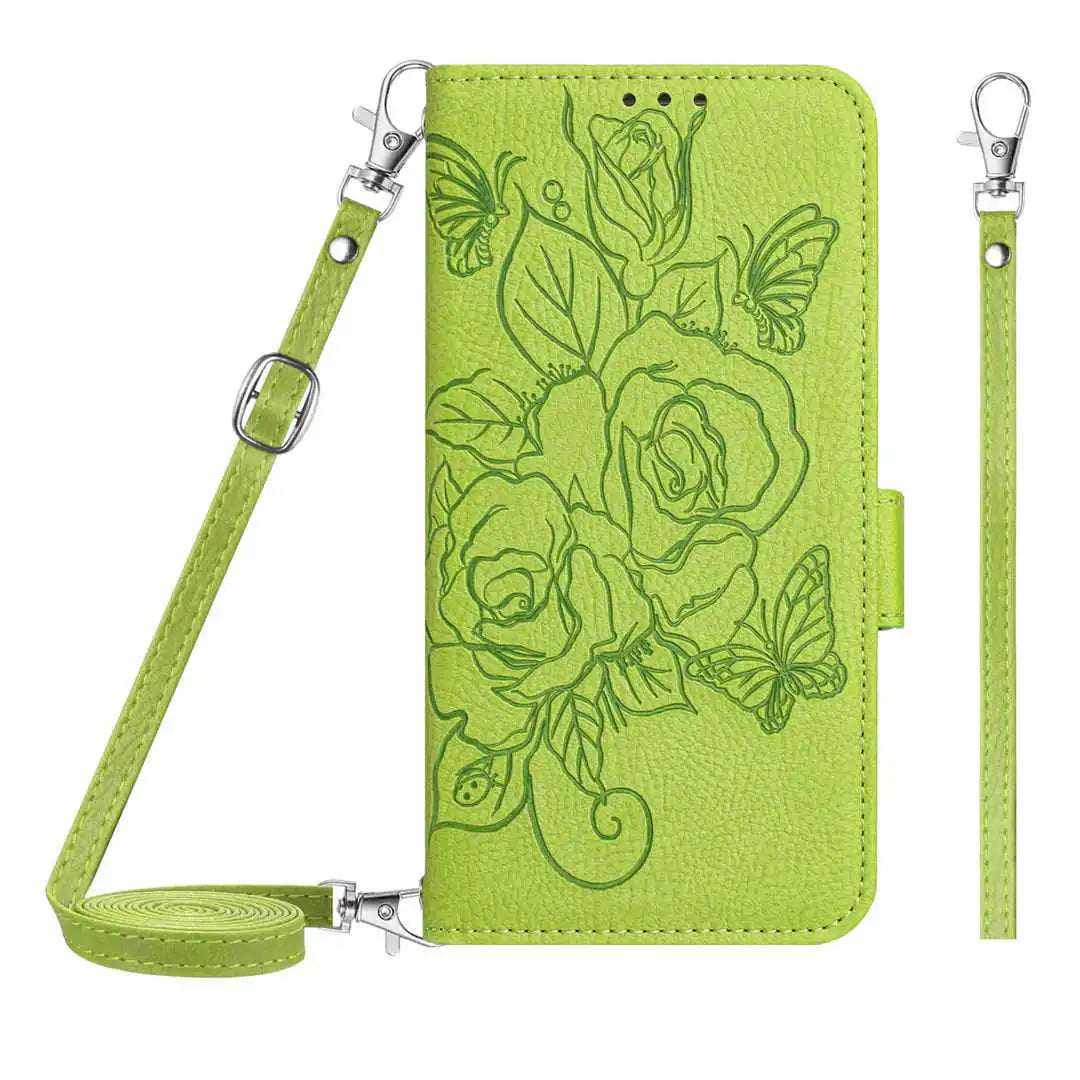 Green wallet phone case with floral design and strap on a white background