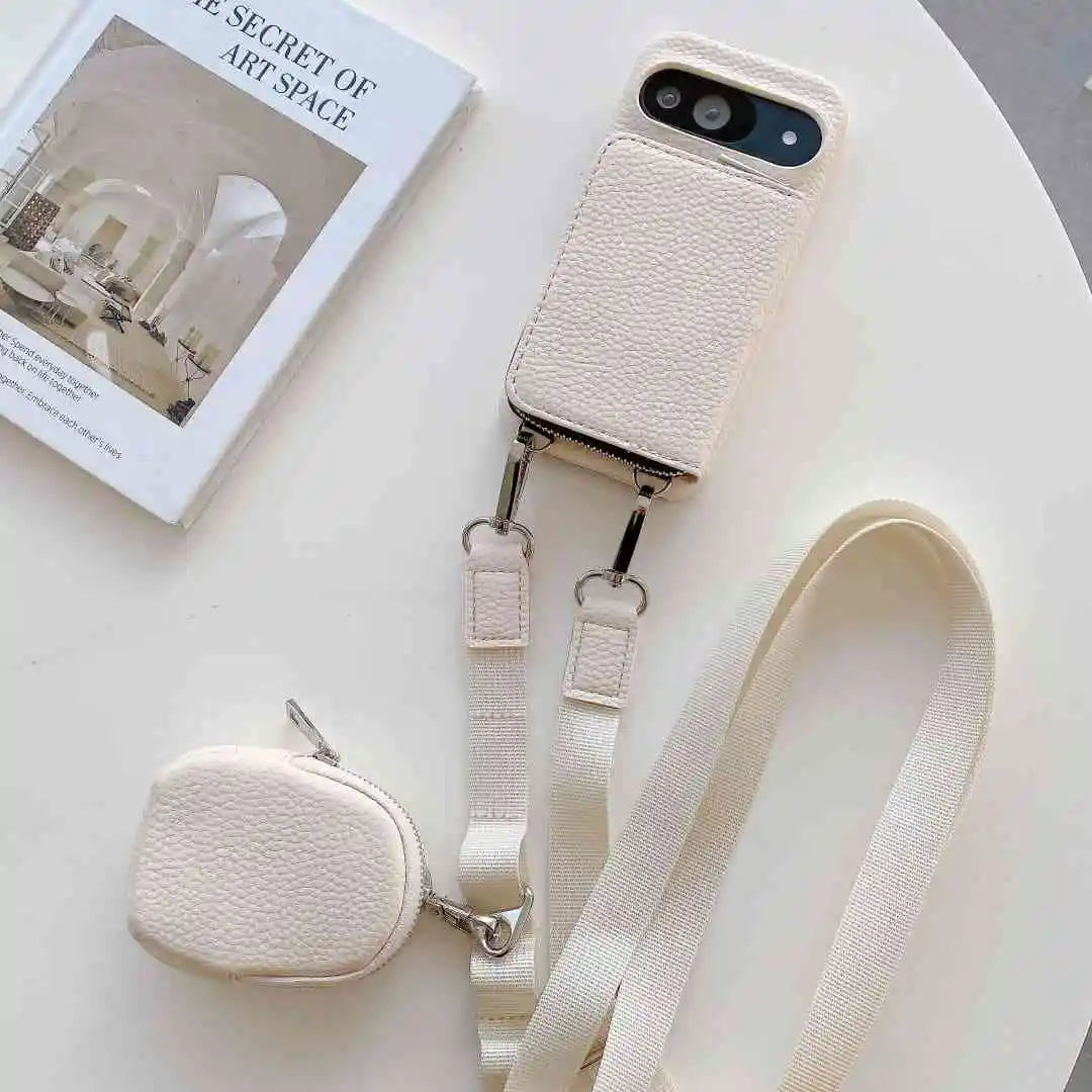 Beige phone case with attached strap and small pouch on a light surface.