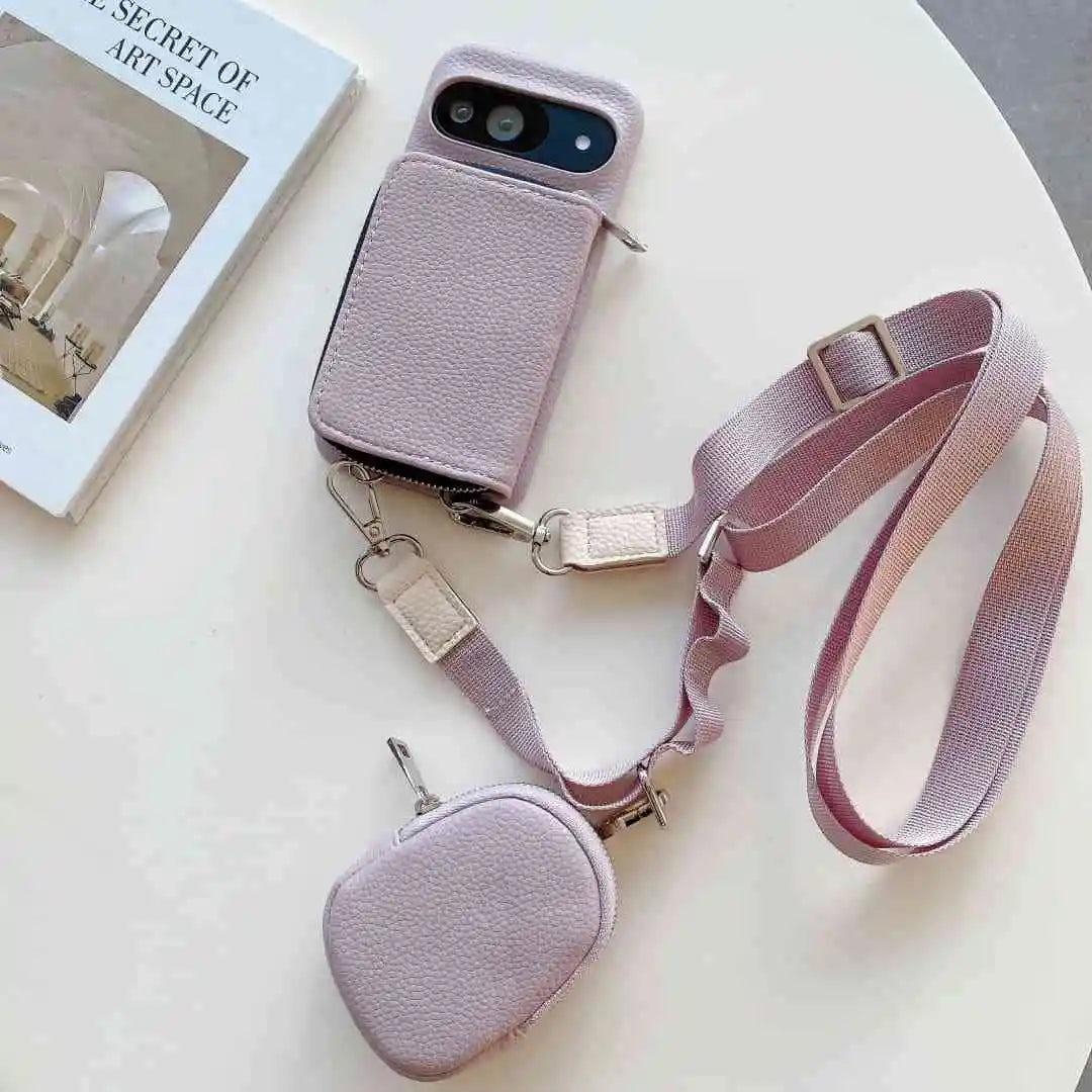 purple phone case with attached strap on and puch a white surface