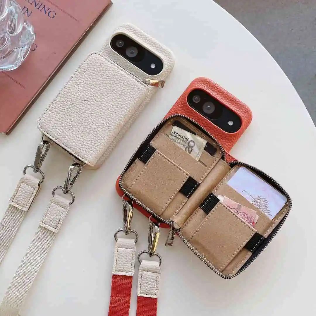 Phone case with wallet and strap on a white surface