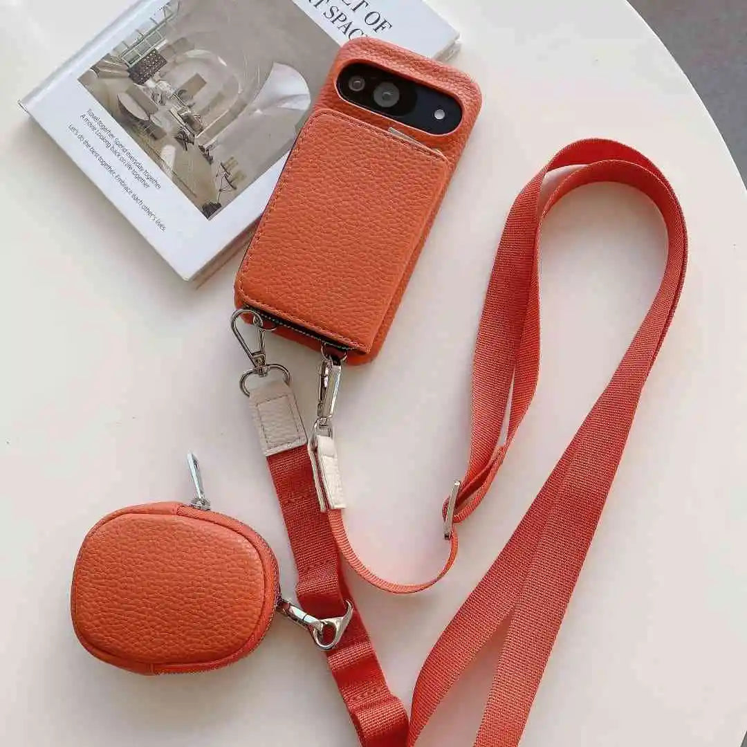 Orange wallet phone case for Pixel with a matching pouch and red strap on a light background