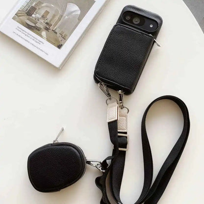 Black wallet phone case for Google Pixel with attached strap and pouch on a white surface