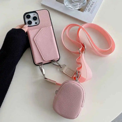 Pink wallet phone case with detachable pouch and strap on a white surface