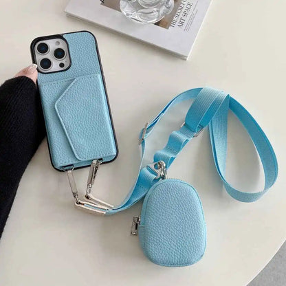 Blue phone case with detachable strap and coin purse on a white surface