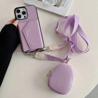 Purple wallet phone case with a strap and small pouch on a white surface