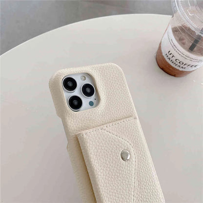 Phone case with a pocket on a white surface next to a coffee cup