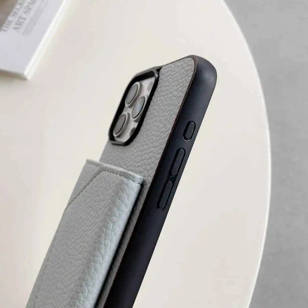 Phone case with textured gray interior and black exterior on a light gray background