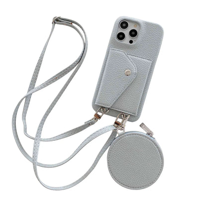 Dusty blue phone case with lanyard and card holder on a white background