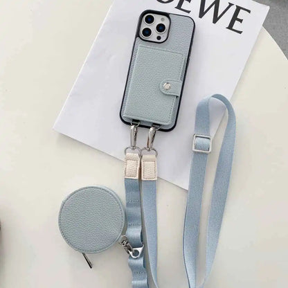 Dusty blue Phone case with lanyard and detachable round pouch on a white surface