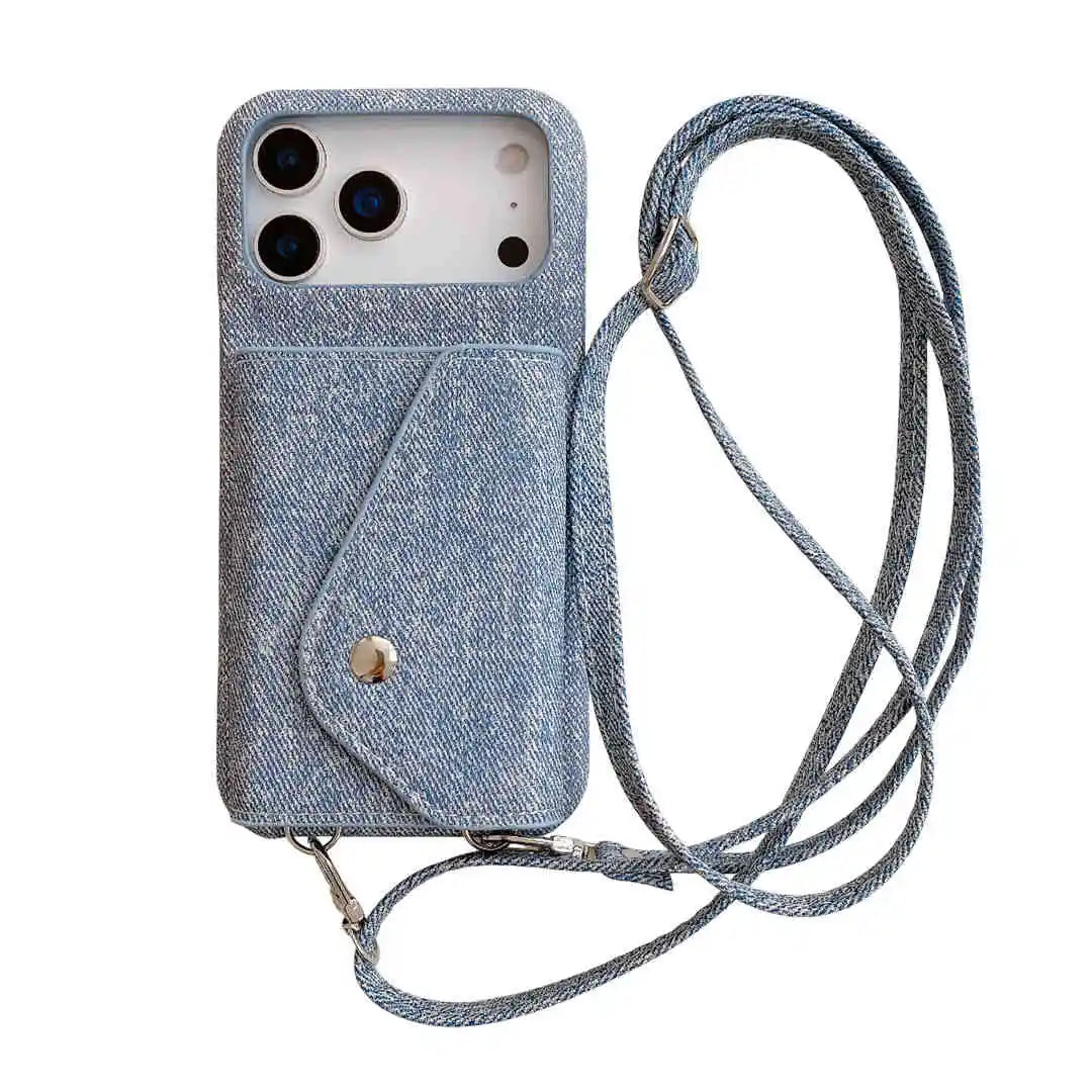 Blue denim wallet phone case with a strap on a white background