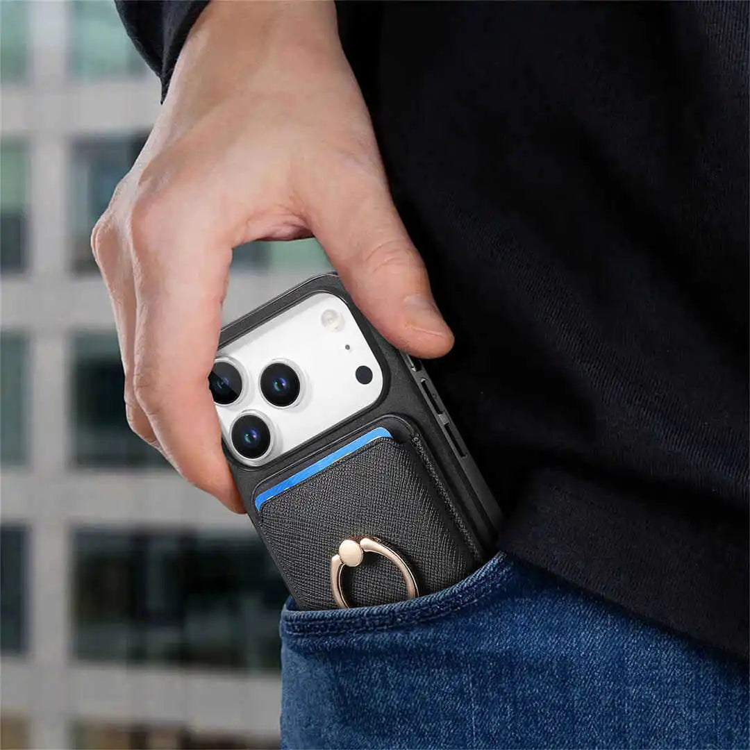 Person holding a phone with a protective case in an urban setting