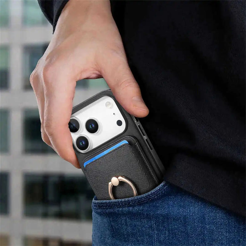 Person holding a phone with a protective case in an urban setting