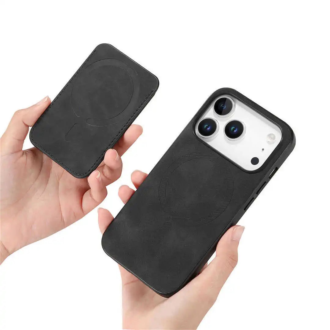 Black phone case with magnetic wallet held by a hand on a white background