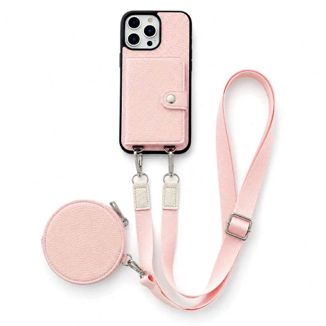 Pink phone case with attached wallet and strap on a white background