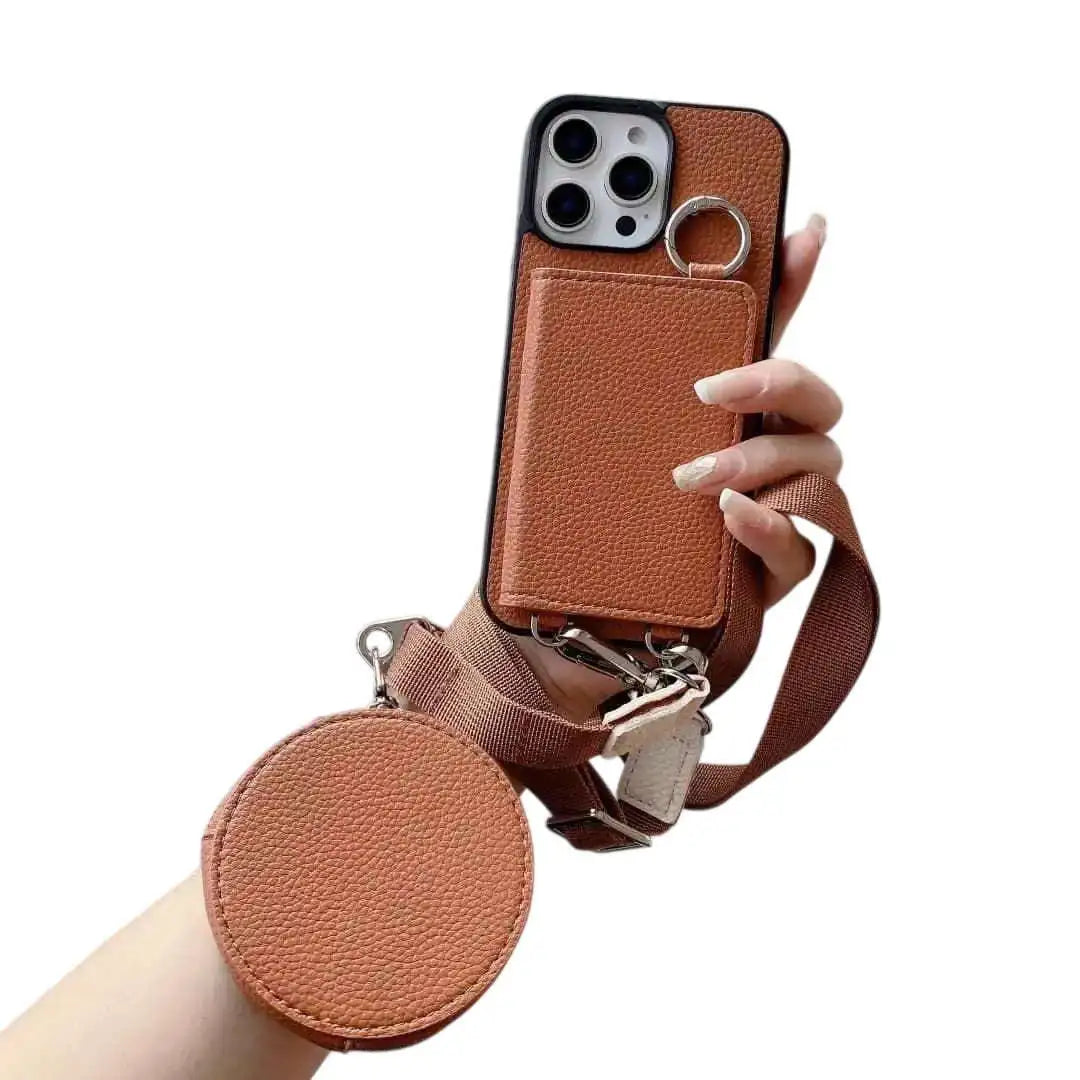 Brown phone case with strap held by a hand on a white background
