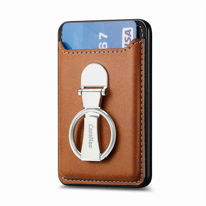 Brown leather cardholder with metal ring and card inside on a white background