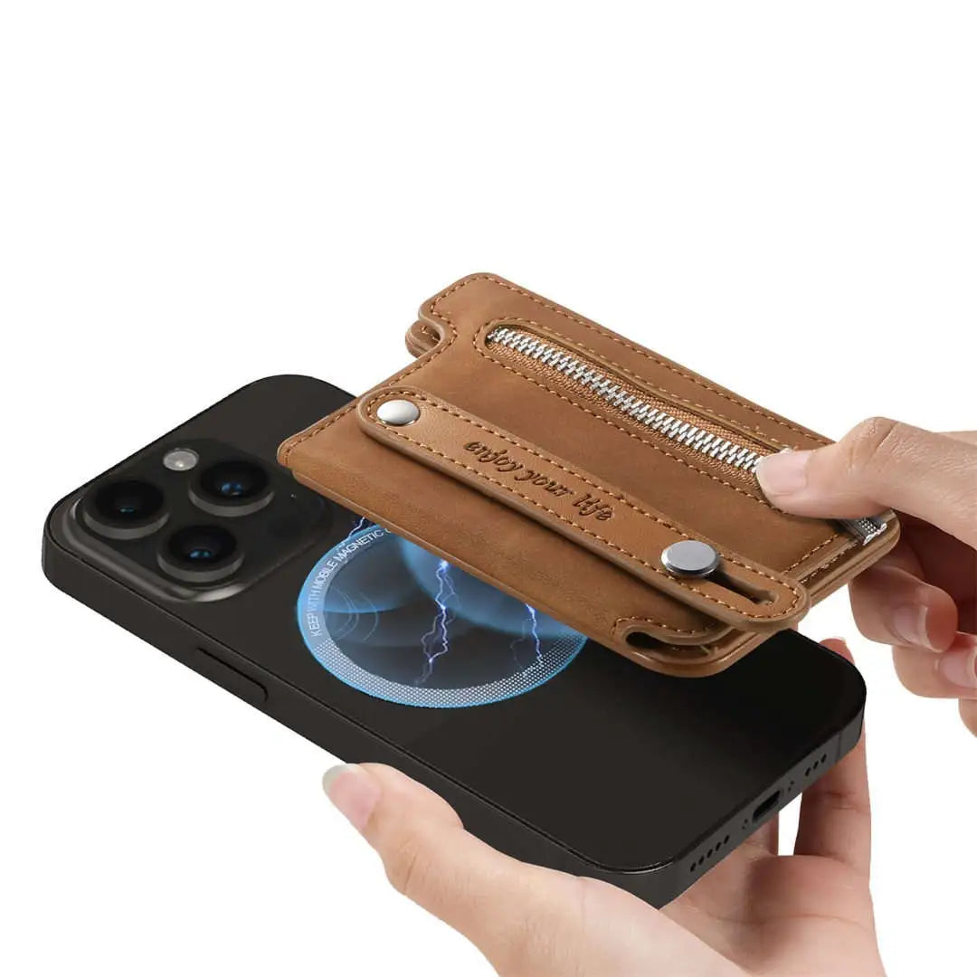 Brown leather wallet with zipper being attached to a black phone case.