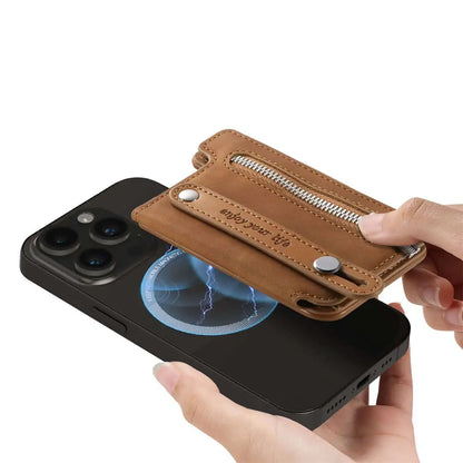 Brown leather wallet with zipper being attached to a black phone case.